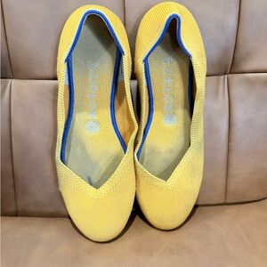 Rothy's Bright Yellow Flats with Blue Trim